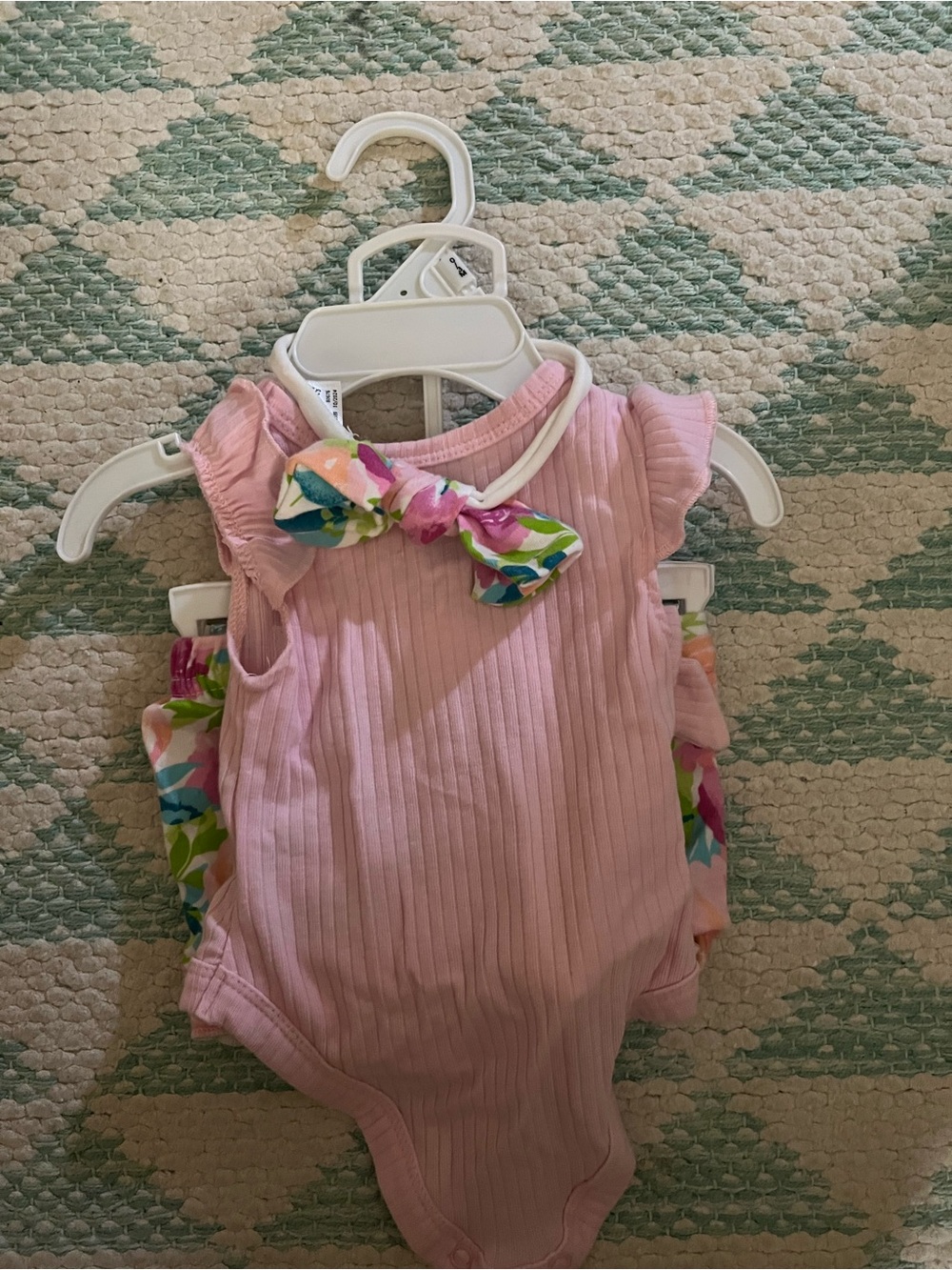 Baby Essentials Pink Ribbed One-Piece with Floral Bow Accent